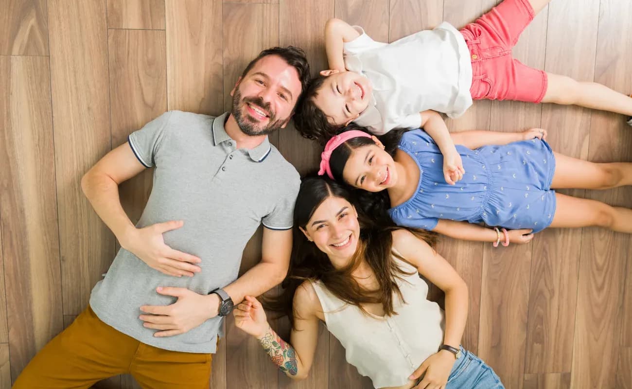 Family on hardwood floor